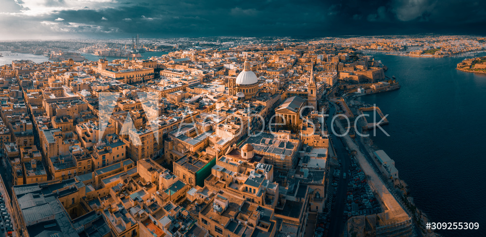Obraz na płótnie City of Valletta, capital of Malta, aerial view, island in Mediterranean sea, dramatic sky w salonie