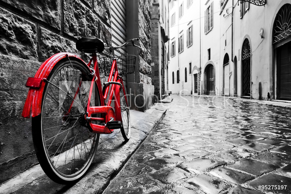 Obraz na płótnie Czerwony rower na starej uliczce | fotoobraz w salonie