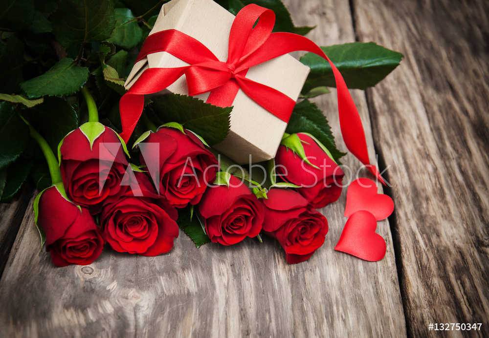 Obraz na płótnie czerwone róże na prezent w salonie